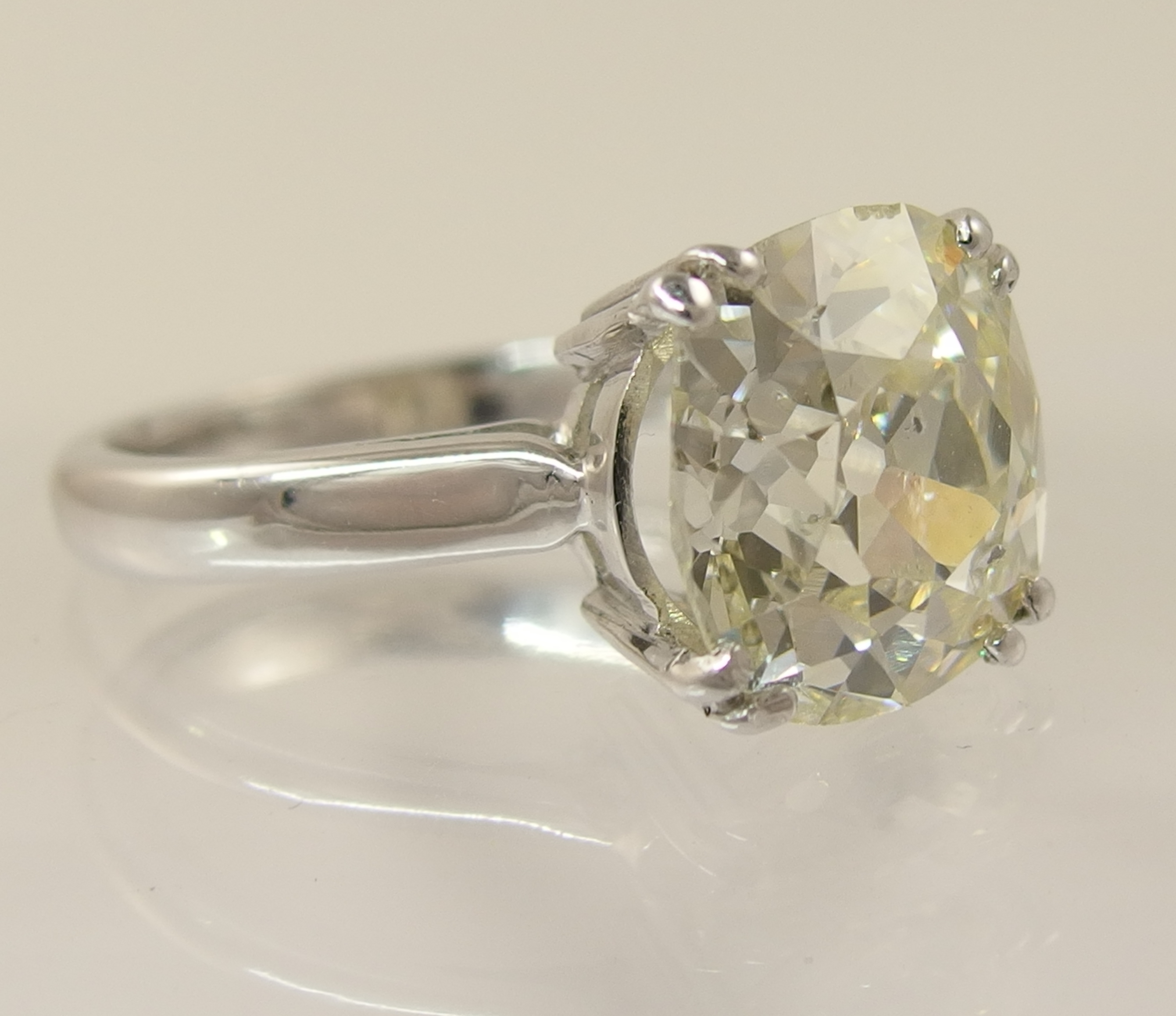 A 5ct cushion cut diamond ring simply split four claw set in 18ct white gold the substantial diamond - Image 6 of 10