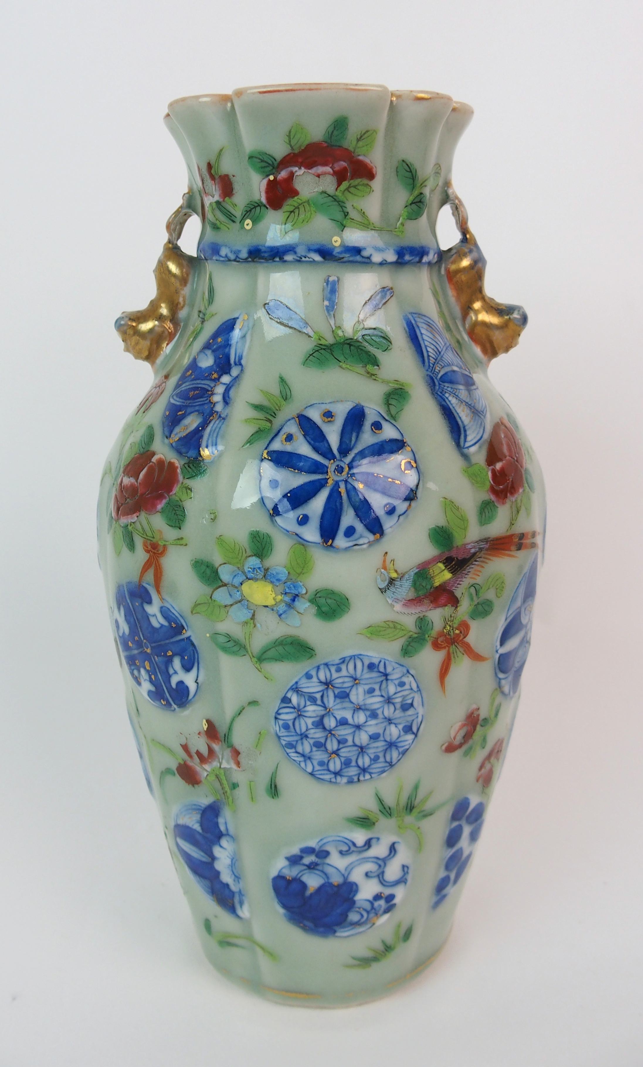 A Cantonese celadon ground and relief moulded sack shaped vase painted with butterflies and - Image 4 of 10