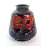 A Moorcroft Pottery "Pomegranate" vase circa 1918, tapering ovoid-form vase with everted rim, ring