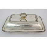 A George III silver entree dish and cover by Richard Cook, London 1809, of rounded rectangular