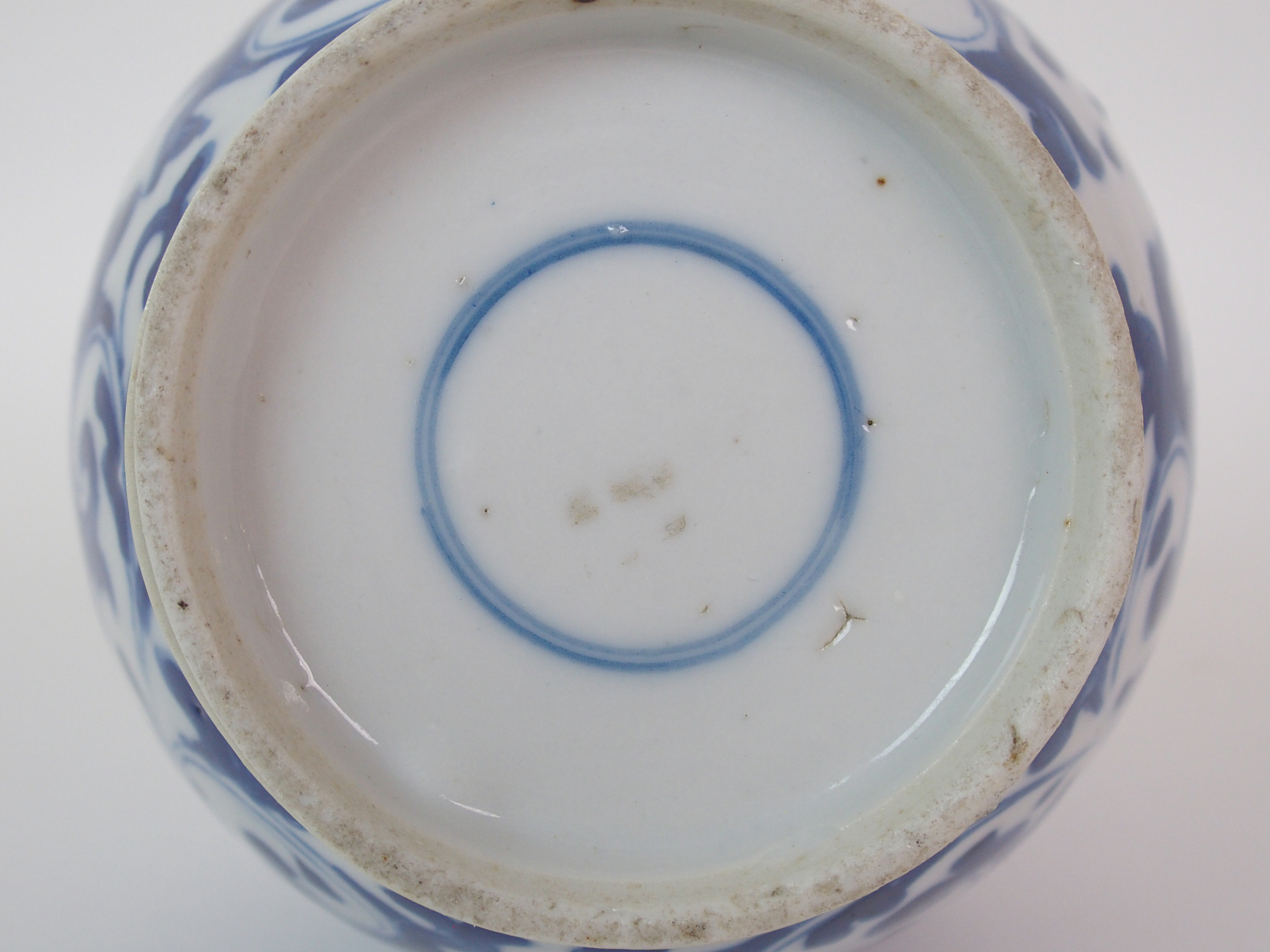 A Chinese blue and white bottle shaped vase painted with peonies and scrolling foliage, blue - Image 9 of 10