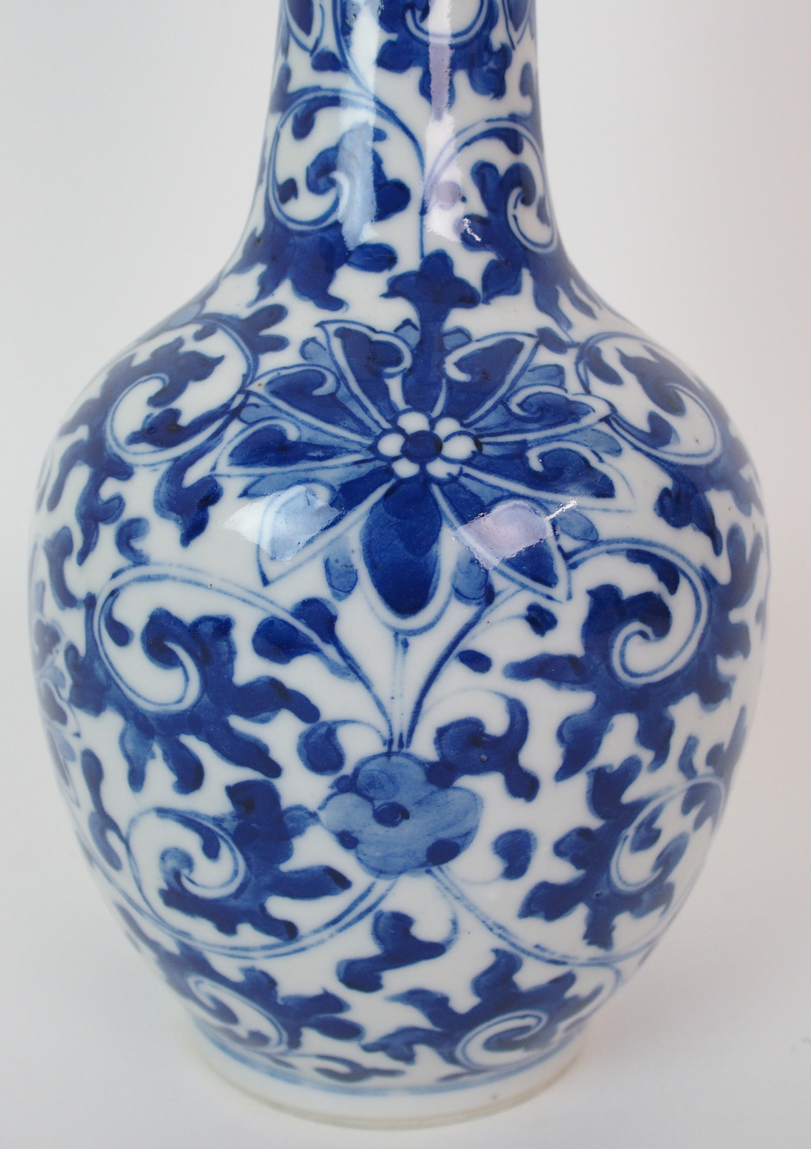 A Chinese blue and white bottle shaped vase painted with peonies and scrolling foliage, blue - Image 2 of 10