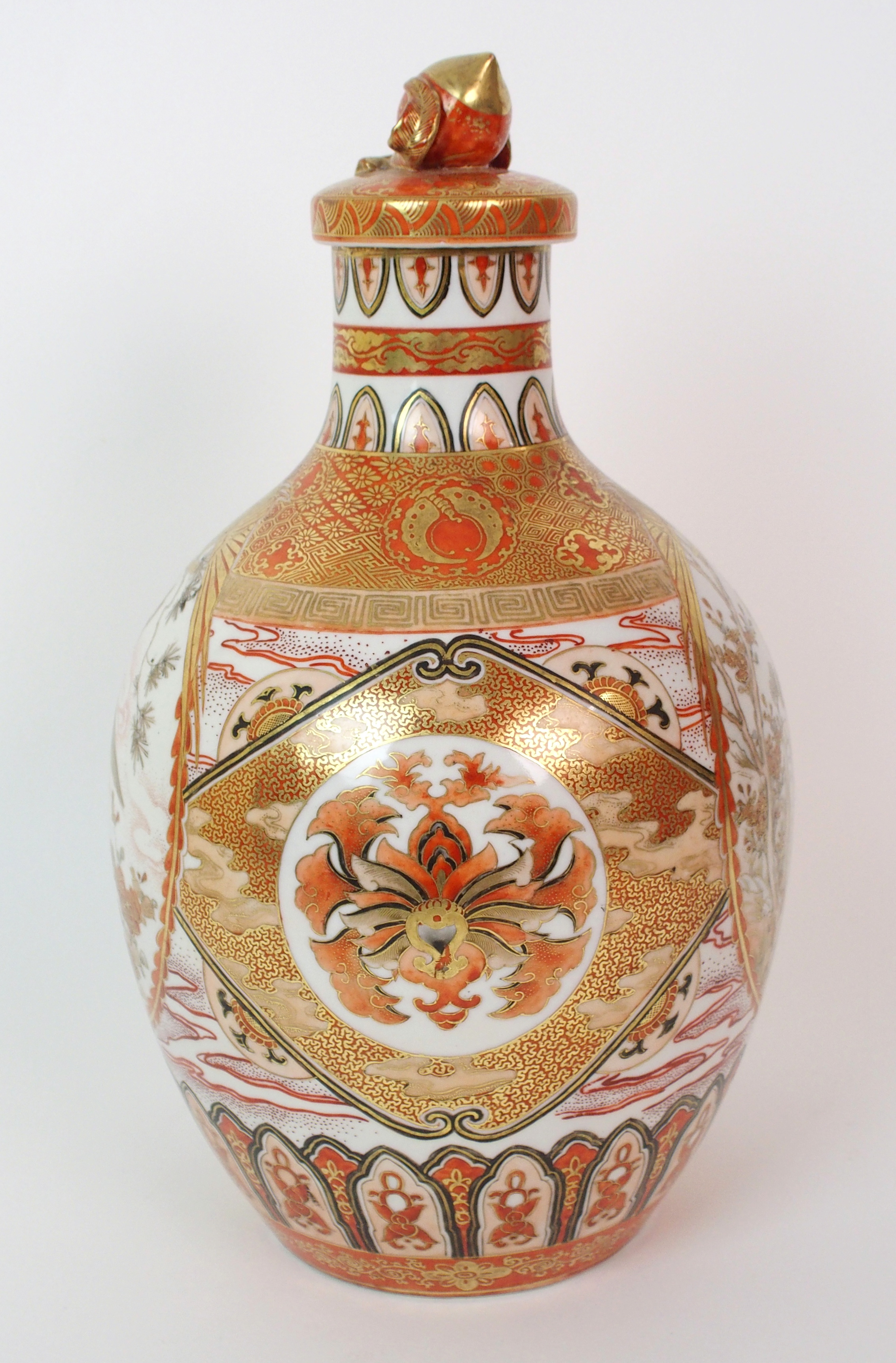 A Kutani bottle shaped vase and cover painted with medallions of figures, peacocks, pine within gilt - Image 4 of 10