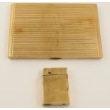 A 9ct reeded pattern cigarette case and a 9ct lighter the cigarette case is 12.4cm x 8.2cm x 0.9cm
