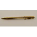 A 14ct gold Cartier propelling pencil with linear engine turned engraving all over, stamped