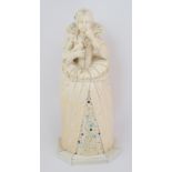 A carved ivory Dieppe work figure of Mary, Queen of Scots depicted standing in traditional regal