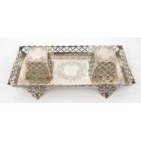 A Victorian silver inkstand by George Fox, London 1880, of rectangular shape, the slanted gallery