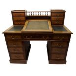 A Victorian mahogany pedestal writing desk the superstructure with baluster turned rail above