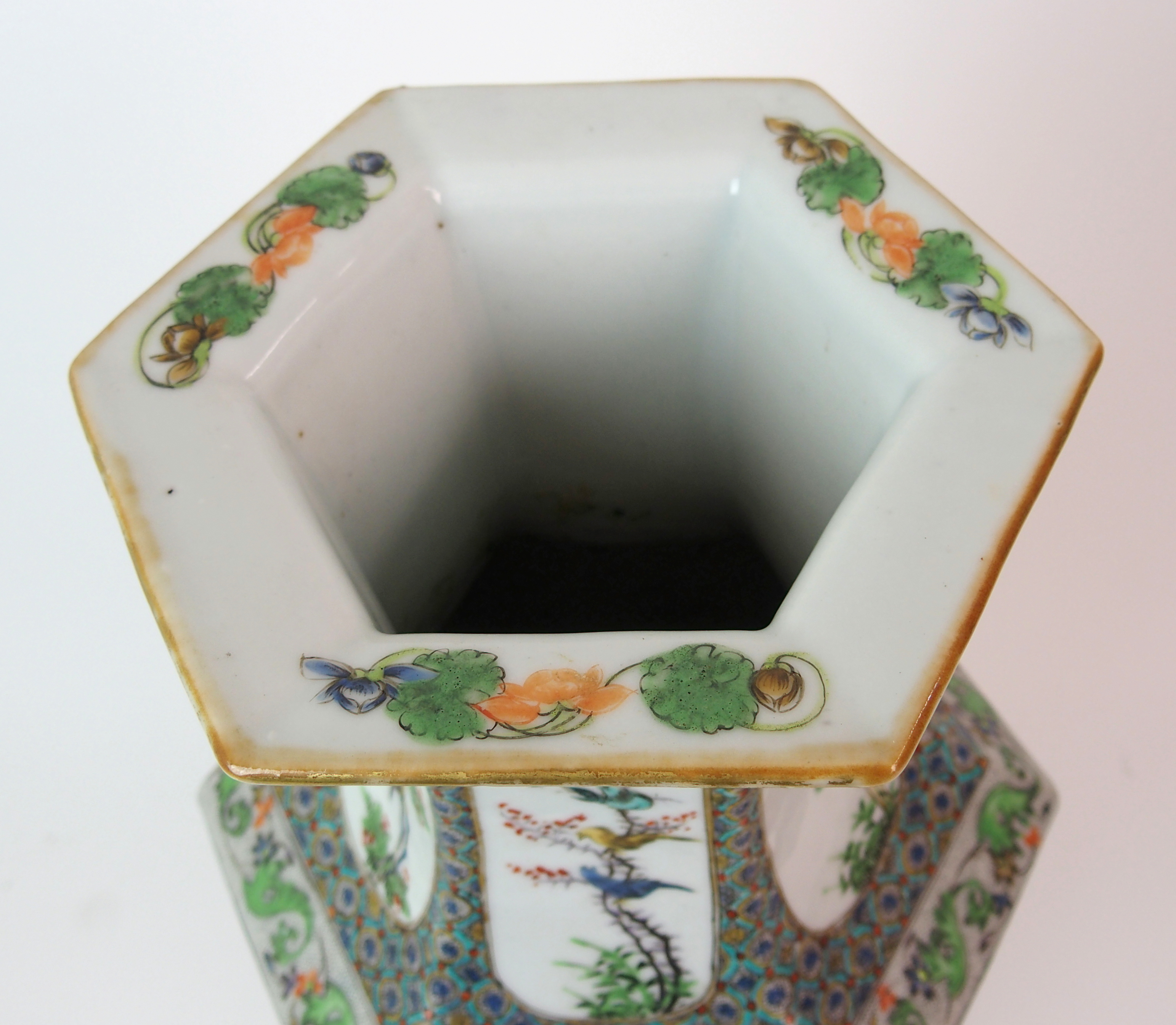 A Cantonese hexagonal tapering vase painted with panels of immortals within foliate and seed - Image 5 of 10