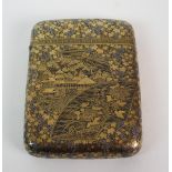 A Japanese Komai cigarette case decorated with villages, foliage and grape vines, 9cm high