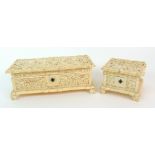 A Cantonese ivory rectangular glove box and cover carved with precious objects above panels of