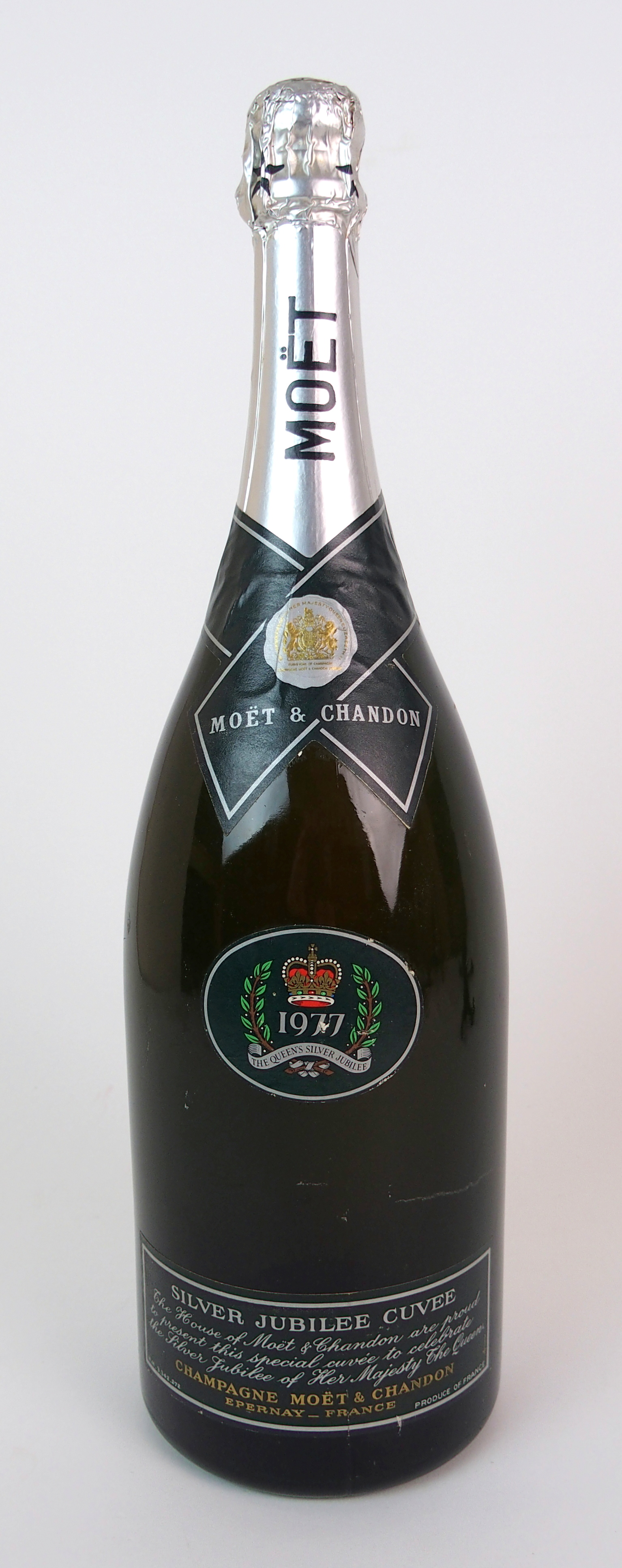A magnum bottle of Moet & Chandon "Silver Jubilee Cuvee" Champagne 1977, marking Queen's Silver