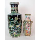 A Chinese famille noir baluster vase painted with exotic birds amongst foliage (adapted as a lamp