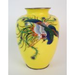 A Japanese yellow ground cloisonne baluster vase decorated with a Ho-o bird, with silver rims,