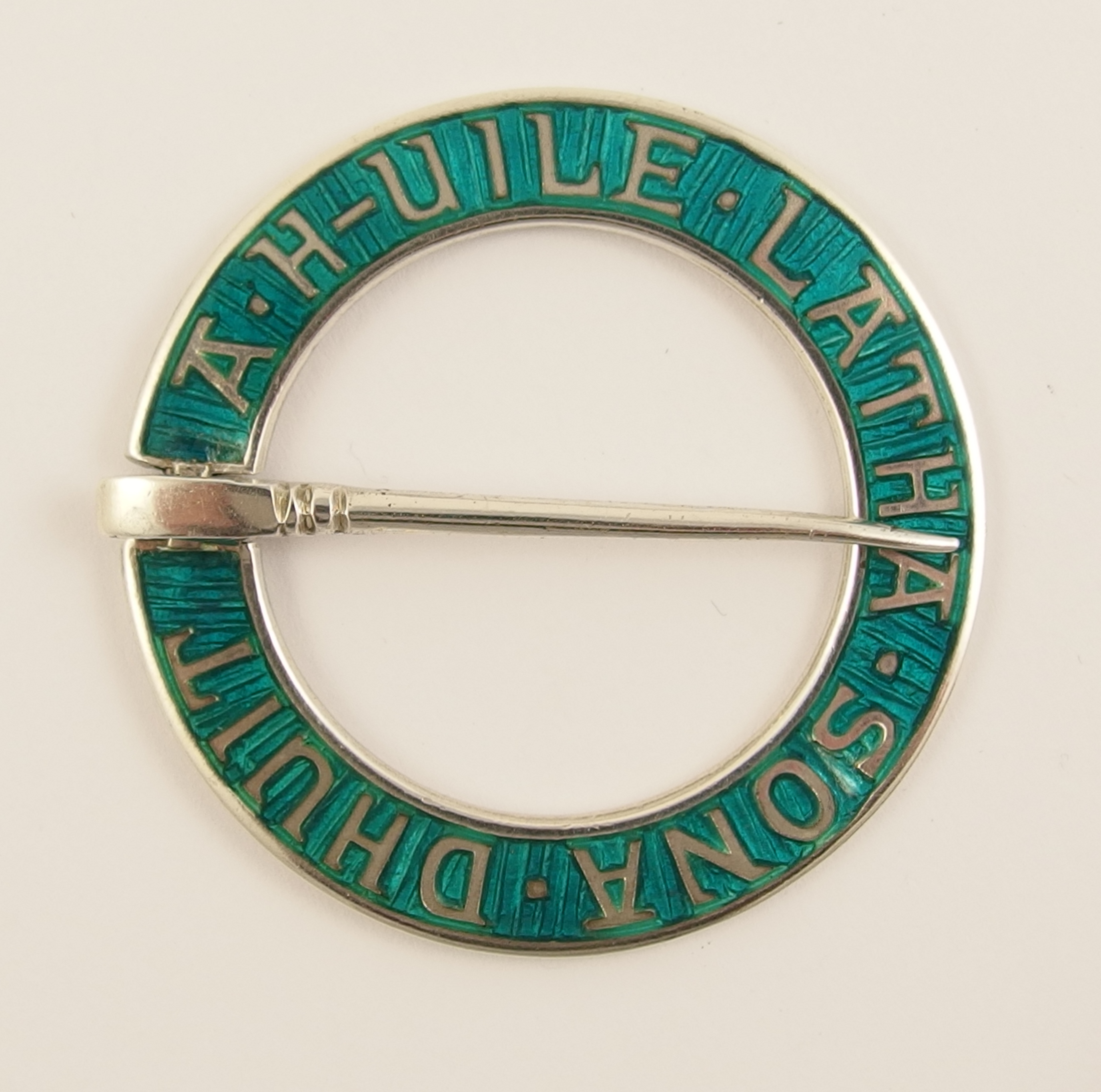 Three Scottish brooches a silver and turquoise green enamel annular brooch designed by Alexander - Image 2 of 8