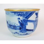 A Chinese blue and white jardiniere painted with two panels of a warrior on horseback approaching