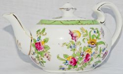 Pullman china Teapot with lid. Floral design with base marked 'Pullman - Dunn Bennett & Co