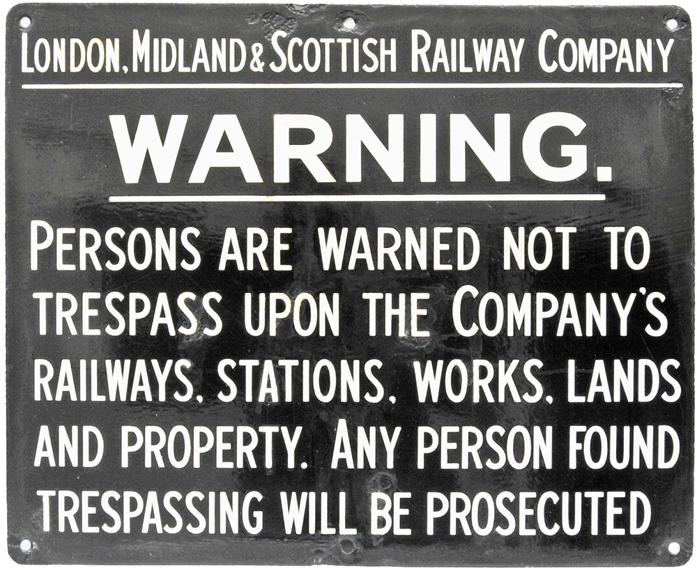 LMS enamel Trespass Sign, white lettering on black ground measuring 22in x 18in. Good colour and