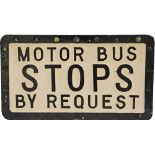 Bus Sign ' Motor Bus Stops By Request'. Cast alloy and double sided measuring 21in x 12in. Some of