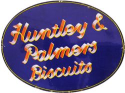 Advertising Enamel Huntley & Palmers Biscuits , oval in shape with red yellow and grey lettering