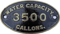 Water Capacity 3500 Galls brass oval Tenderplate. Together with a cast iron rectangular 4000 Gallons