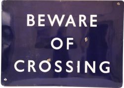 BR(E) Enamel Sign, fully flanged reads:- Beware Of Crossing . Measure 40in x 32in and is in very