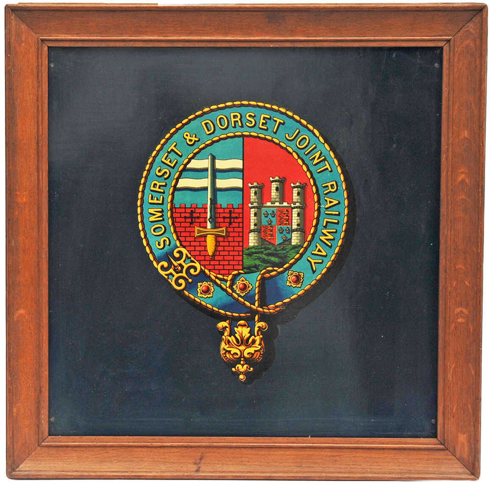 Somerset and Dorset Joint Railway Coats of Arms in an old oak frame.