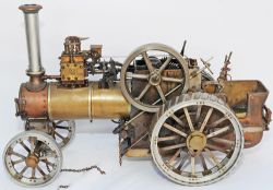 Live Steam Traction Engine of early design. Model measures 12 inches tall x18 inches long, front