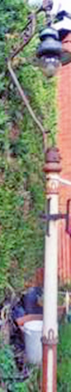 GWR cast iron Lamp Post with half-harp ornate lamp top having a Sugg 'Mexican Hat' lamp with globe