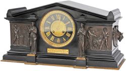 A marble and bronze Presentation Clock with brass plate 'Presented to Mr Edward Newson by his