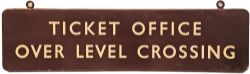 BR(W) enamel Station Sign 'Ticket Office Over Level Crossing'. Double sided with original hangings