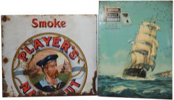 Advertising signs x 2 one is a celluoid & tinplate Sign 'Capstan Navy Cut Cigarettes with a small