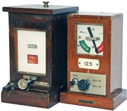 A pair of GWR mahogany cased Lamp Repeaters. One is the early flag-type the other a later 1947 type.