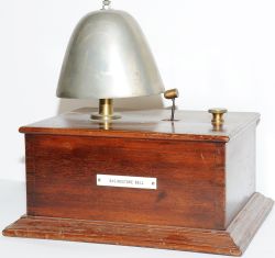 Mahogany cased Block Bell with large 'sheep bell' affixed. Bears a traffolite location plate '