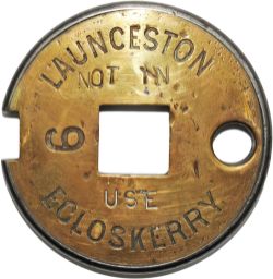 Tyers No 6 brass and steel Single Line Tablet LAUNCESTON - EGLOSKERRY No 9 stamped 'Not In Use'.