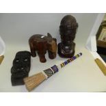 A group of wooden carvings, to include a