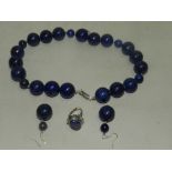 A lapis lazuli bead necklace together wi