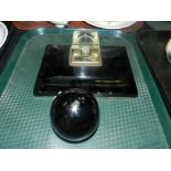 A glass ink stand and dump glass paperwe