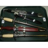 A group of replica Nazi style knives and