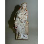 A Staffordshire figure of Charity, model