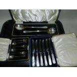 A cased set of six silver coffee spoons,