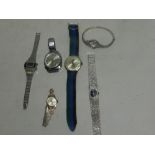 A collection of six wristwatches.*