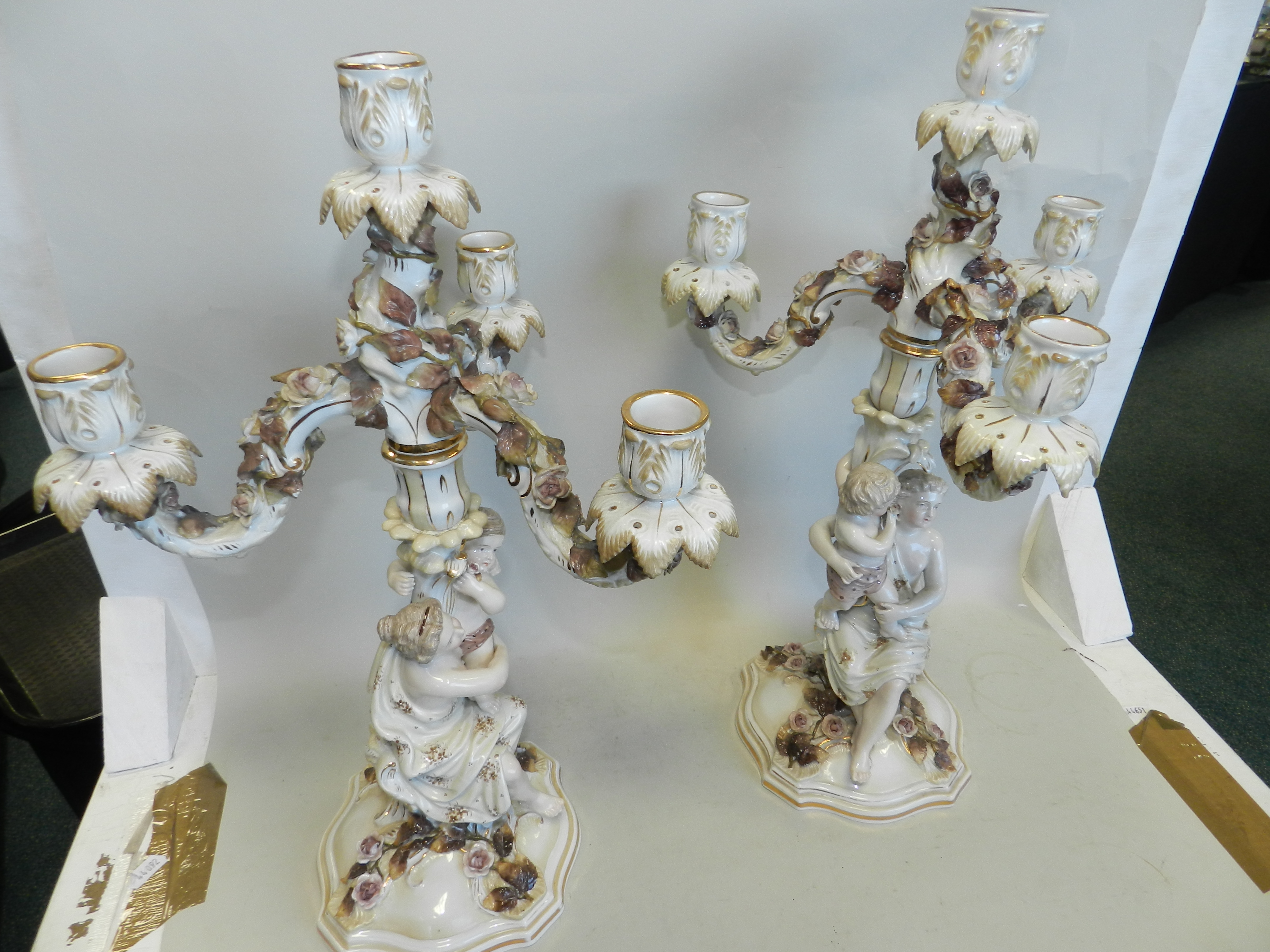 A pair of Sitzendorf figural candelabra,