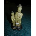 A soapstone carving of two female figure