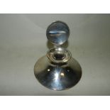 A silver mounted capstan inkwell.