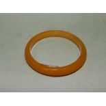 A reconstituted amber bangle.*