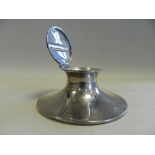 A silver mounted capstan inkwell.*