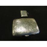 A silver cigarette case with bright cut