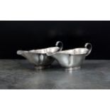 A pair of Edwardian silver sauce boats,