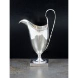 A George III silver helmet cream jug, RE